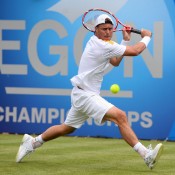 Lleyton Hewitt plays a backhand during his first round win over Michael Russell at the AEGON Championships at Queen's Club in London, England; Getty Images