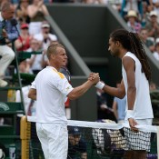 Lleyton Hewitt (left) shakes hands with Dustin Brown after Brown defeated him in four sets in the second round. GETTY IMAGES