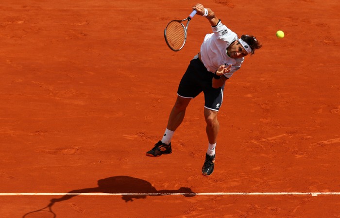 David Ferrer of Spain deploys a kick-serve at the 2013 French Open in Paris, France; Getty Images