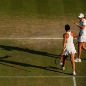 Casey Dellacqua (L) and Ash Barty in action during the ladies' doubles final on Centre Court at Wimbledon against No.8 seeds Su-Wei Hsieh and Peng Shuai; Getty Images