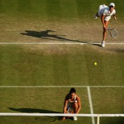Casey Dellacqua (at net) and Ash Barty in action during the ladies' doubles final on Centre Court at Wimbledon against No.8 seeds Su-Wei Hsieh and Peng Shuai; Getty Images