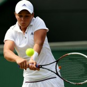 Ash Barty plays a backhand while partnering Casey Dellacqua during their semifinal win over No.7 seeds Anna-Lena Groenefeld and Kveta Peschke; Getty Images