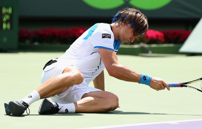David Ferrer collapses with cramp on the way to a three-set defeat at the hands of Andy Murray during the Sony Open final in Key Biscayne, Florida; Getty Images