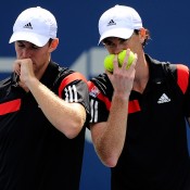 Jamie Murray (R) of Great Britain and John Peers of Australia discuss tactics during their 7-6(4) 6-4 first round win over No.9 seeds David Marrero and Fernando Verdasco of Spain at the 2013 US Open in New York City; Getty Images