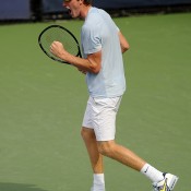 Harry Bourchier of Australia celebrates a point during his boys' singles first round match against Daniel Kerznerman of the United States at the 2013 US Open; Getty Images