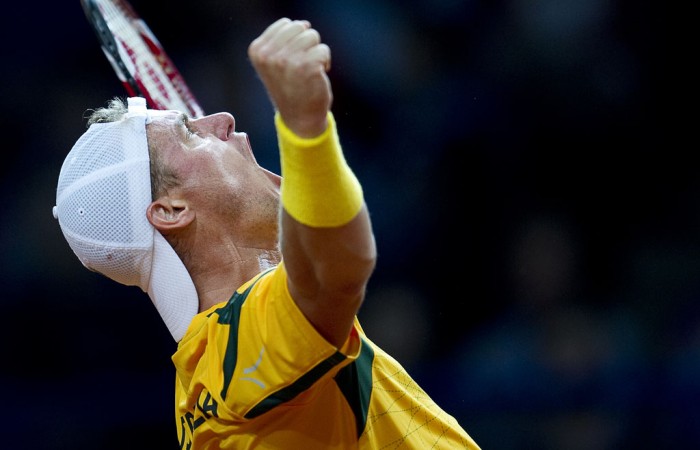 Lleyton Hewitt celebrates his 6-1 6-3 6-2 victory over Lukasz Kubot; Getty Images
