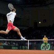 Mariusz Fyrstenberg of Poland plays a spectacular return during the doubles rubber against Aussies Chris Guccione and Nick Kyrgios in the Australia v Poland Davis Cup tie; Getty Images