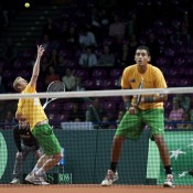 Chris Guccione (serving) and Nick Kyrgios in action during the doubles rubber of the Australia v Poland Davis Cup tie; Getty Images