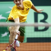 Bernard Tomic in action during his match against Michal Przysiezny; Getty Images