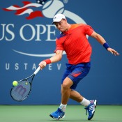 Playing a forehand, James Duckworth won the opening set of his first round match against fellow wildcard Tim Smyczek of the United States on Day 3 of the 2013 US Open, before ultimately going down in four sets; Getty Images