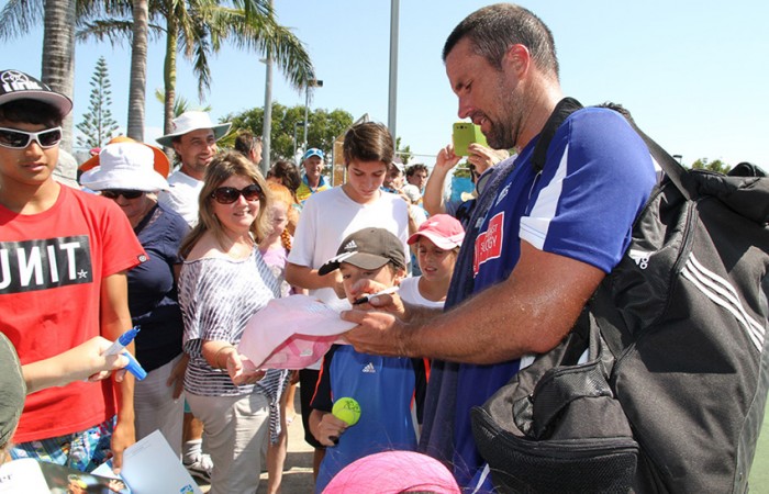 Pat Rafter signs autographs for fans after his win for Sunshine Coast Breakers in the ATL Queensland Conference against Gavin Van Peperzeel of the Tennis Brisbane Chargers; Tennis Queensland