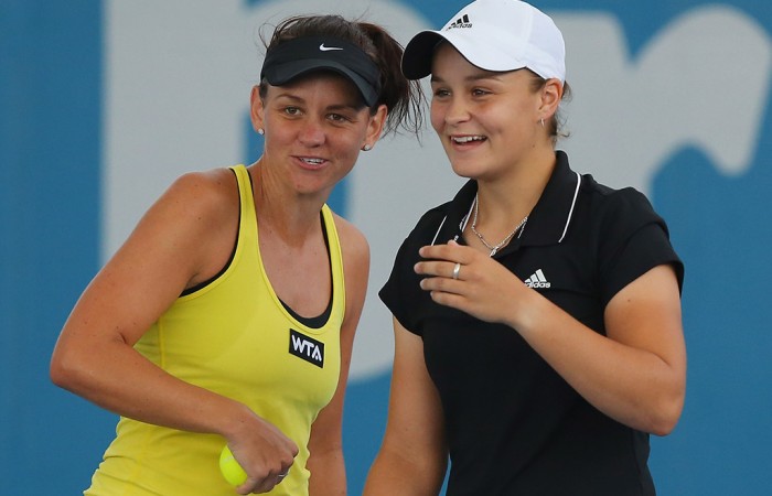 BRISBANE, AUSTRALIA - DECEMBER 31:  Casey Dellacqua and Ashleigh Barty of Australia celebrate after winning a point in their doubles match against Varvara Lepchenko of the USA and Raluca Olaru of Romania during day three of the 2014 Brisbane International at Queensland Tennis Centre on December 31, 2013 in Brisbane, Australia.  (Photo by Chris Hyde/Getty Images)