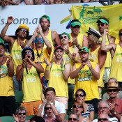Australian fans 'Fanatics' watch Lleyton Hewitt of Australia in his first round match against Andreas Seppi of Italy during day two of the 2014 Australian Open at Melbourne Park on January 14, 2014 in Melbourne, Australia.  (Photo by Clive Brunskill/Getty Images)