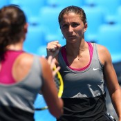 MELBOURNE, AUSTRALIA - JANUARY 17:  Sara Errani of Italy celebrates winning a point in her second round doubles match with Roberta Vinci of Italy against Kaia Kanepi of Estonia and Renata Voracova of the Czech Republic during day five of the 2014 Australian Open at Melbourne Park on January 17, 2014 in Melbourne, Australia.  (Photo by Renee McKay/Getty Images)