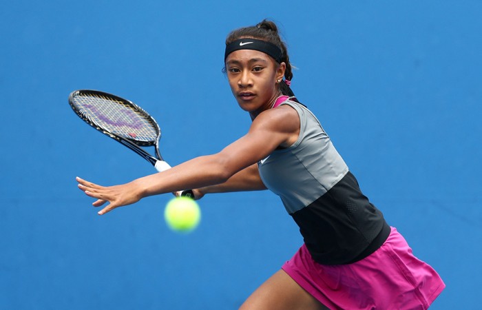 MELBOURNE, AUSTRALIA - JANUARY 18:  Destanee Aiava of Australia plays a forehand in her first round junior girls' match against Verena Hofer of Italy during the 2014 Australian Open Junior Championships at Melbourne Park on January 18, 2014 in Melbourne, Australia.  (Photo by Matt King/Getty Images)