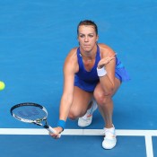 MELBOURNE, AUSTRALIA - JANUARY 18:  Anastasia Pavlyuchenkova of Russia plays a shot in her third round match against Agnieszka Radwanska of Poland during day six of the 2014 Australian Open at Melbourne Park on January 18, 2014 in Melbourne, Australia.  (Photo by Quinn Rooney/Getty Images)