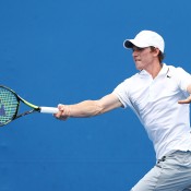 Harry Bourchier of Australia plays a forehand in his first round junior boys' match against Sumit Nagal of India during the 2014 Australian Open Junior Championships at Melbourne Park on January 18, 2014 in Melbourne, Australia.  (Photo by Matt King/Getty Images)