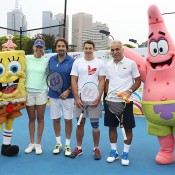 Alicia Molik, Henri Leconte, Billy Slater and Mansour Bahrami pose with Nickelodeon characters Spongebob Squarepants and Patrick Star following the Celebrity Slam match as part of Kids Tennis Day ahead of the 2014 Australian Open at Melbourne Park on January 11, 2014 in Melbourne, Australia.  (Photo by Graham Denholm/Getty Images)