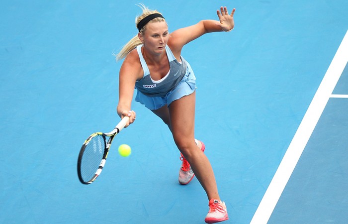 Australia's Sacha Jones competes against Japan's Sachie Ishzu in day one of qualifying at the ASB Classic WTA International; Getty Images