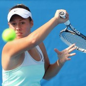 MELBOURNE, AUSTRALIA - JANUARY 09:  Sara Tomic of Australia plays a forehand in her match against Tamira Paszek of Austria during qualifying for the 2014 Australian Open at Melbourne Park on January 9, 2014 in Melbourne, Australia.  (Photo by Robert Prezioso/Getty Images)
