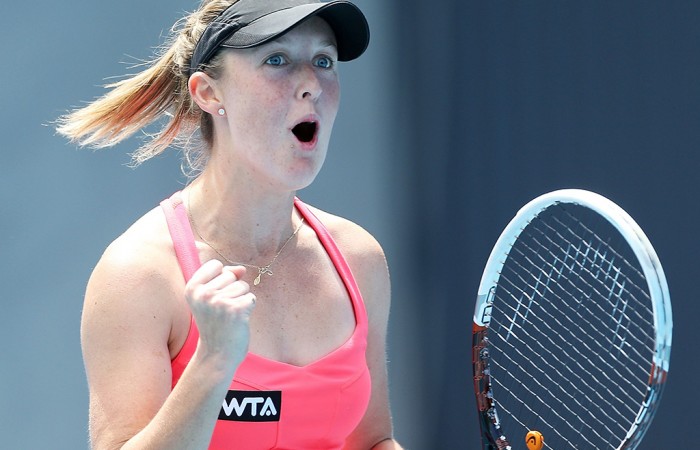 Storm Sanders of Australia celebrates winning match point in her first round match against Shuai Peng of China during day three of the Moorilla Hobart International at Domain Tennis Centre on January 7, 2014 in Hobart, Australia.  (Photo by Mark Metcalfe/Getty Images)