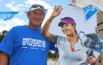 Watervale Tennis Club president David Long poses with a picture of AO2014 champion Li Na at the AO Blitz town party in Watervale, South Australia; Tennis Australia