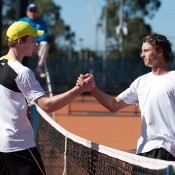 Jake Delaney (L) shakes hands with Cormac Clissold after winning the final of the Gallipoli Youth Cup at Melbourne Park; Elizabeth Xue-Bai