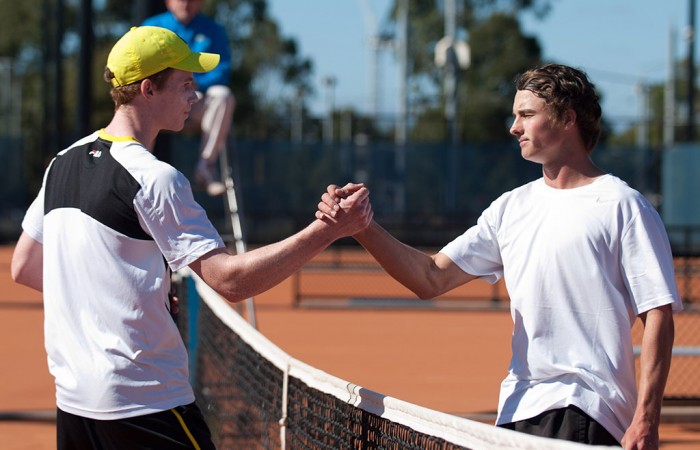 Jake Delaney (L) shakes hands with Cormac Clissold after winning the final of the Gallipoli Youth Cup at Melbourne Park; Elizabeth Xue-Bai