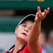 Ash Barty in action against 20th seed Alize Cornet on Court Philippe Chatrier in the first round at Roland Garros; Elizabeth Xue Bai