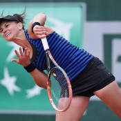 Casey Dellacqua in action during her first round victory over Lourdes Dominguez Lino at Roland Garros; Getty Images