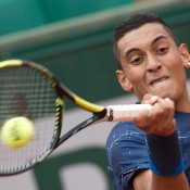 Nick Kyrgios in action against No.8 seed Milos Raonic in the first round at Roland Garros; Elizabeth Xue Bai