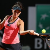 Casey Dellacqua in action during her second round loss to Li Na at the Internazionali BNL d'Italia in Rome; Getty Images