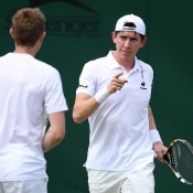 John-Patrick Smith (R) and British partner Jonathan Marray in action during the Wimbledon men's doubles event; Getty Images