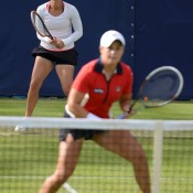 Ash Barty (foreground) and Casey Dellacqua in action during their first-round doubles victory over Timea Babos and Kristina Mladenovic at the WTA Birmingham event; Christopher Levy