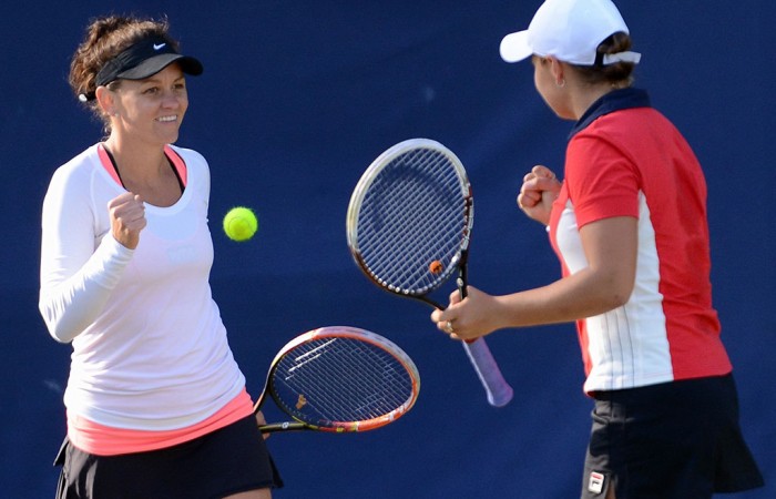 Ash Barty (R) and Casey Dellacqua celebrate their first-round doubles victory over Timea Babos and Kristina Mladenovic at the WTA Birmingham event; Christopher Levy