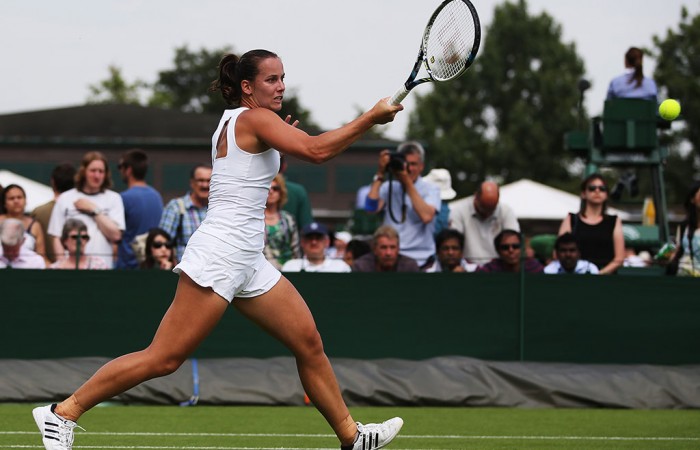 Jarmila Gajdosova plays a forehand en route to victory over Swiss Stefanie Voegele in the first round at Wimbledon; Getty Images