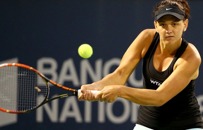 Casey Dellacqua in action during her second round loss to No.2 seed Petra Kvitova at the WTA Rogers Cup in Montreal; Getty Images