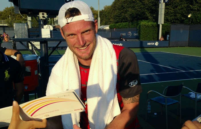 US Open: Aussies in Week 1 Sam Groth signs autographs for fans after his first-round victory over Albert Ramos-Vinolas at the US Open in New York; Getty Images