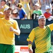 Chris Guccione (L) and Lleyton Hewitt celebrate after sealing Australia's 3-0 Davis Cup victory over Uzbekistan in the World Group Play-offs at Cottesloe Tennis Club; Getty Images