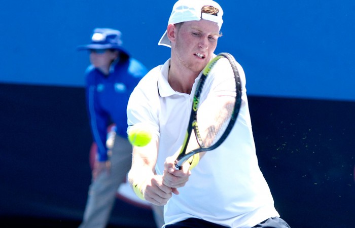 Harry Bourchier plays a backhand en route to victory in the semifinals of the 2014 18/u Australian Championships at Melbourne Park; Getty Images