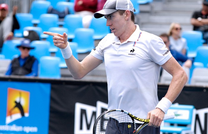 John-Patrick Smith in action in the semifinals of the Australian Open 2015 Play-off; Mae Dumrigue