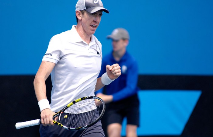John-Patrick Smith in action during his quarterfinal victory over Blake Mott at the Australian Open 2015 Play-off; Mae Dumrigue