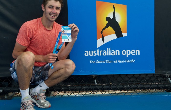 Jordan Thompson poses with his Australian Open 2015 player accreditation following victory in the final of the Australian Open 2015 Play-off; Elizabeth Xue Bai