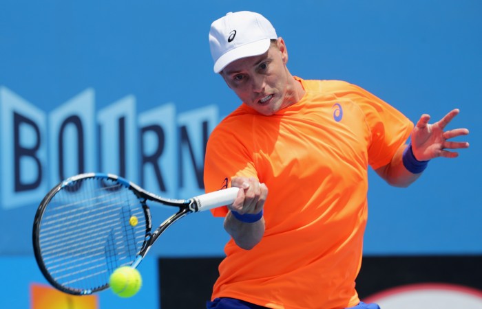 MELBOURNE, AUSTRALIA - JANUARY 19:  James Duckworth of Australia plays a forehand in his first round match against Blaz Kavcic of Slovenia during day one of the 2015 Australian Open at Melbourne Park on January 19, 2015 in Melbourne, Australia.  (Photo by Wayne Taylor/Getty Images)