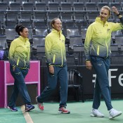 The Australian Fed Cup team of (from front) captain Alicia Molik, Sam Stosur, Casey Dellacqua and Jarmila Gajdosova enter Porsche Arena for the Fed Cup official draw; Paul Zimmer/ITF