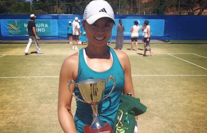 Alison Bai holds the trophy after winning the women's singles title at the Mildura Grand International