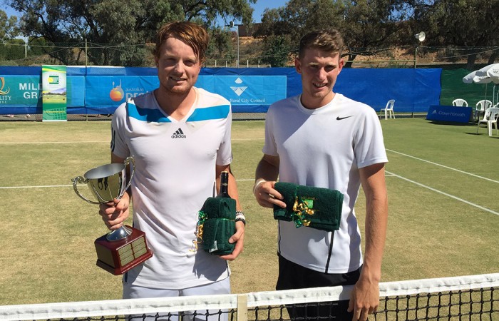 Matthew Barton (L) poses with his trophy after defeating Harry Bourchier (R) in the men's singles final of the Mildura Grand International