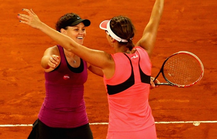 Casey Dellacqua (L) and Yaroslava Shvedova celebrate their doubles title at the 2015 Mutua Madrid Open; Getty Images
