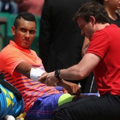 Nick Kyrgios receives medical treatment during his third round loss to No.3 seed Andy Murray on Court Suzanne Lenglen; Getty Images