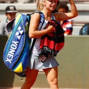 Daria Gavrilova exits the court in tears after being forced to retire from her second round match with an abdominal injury against Sabine Lisicki; Getty Images